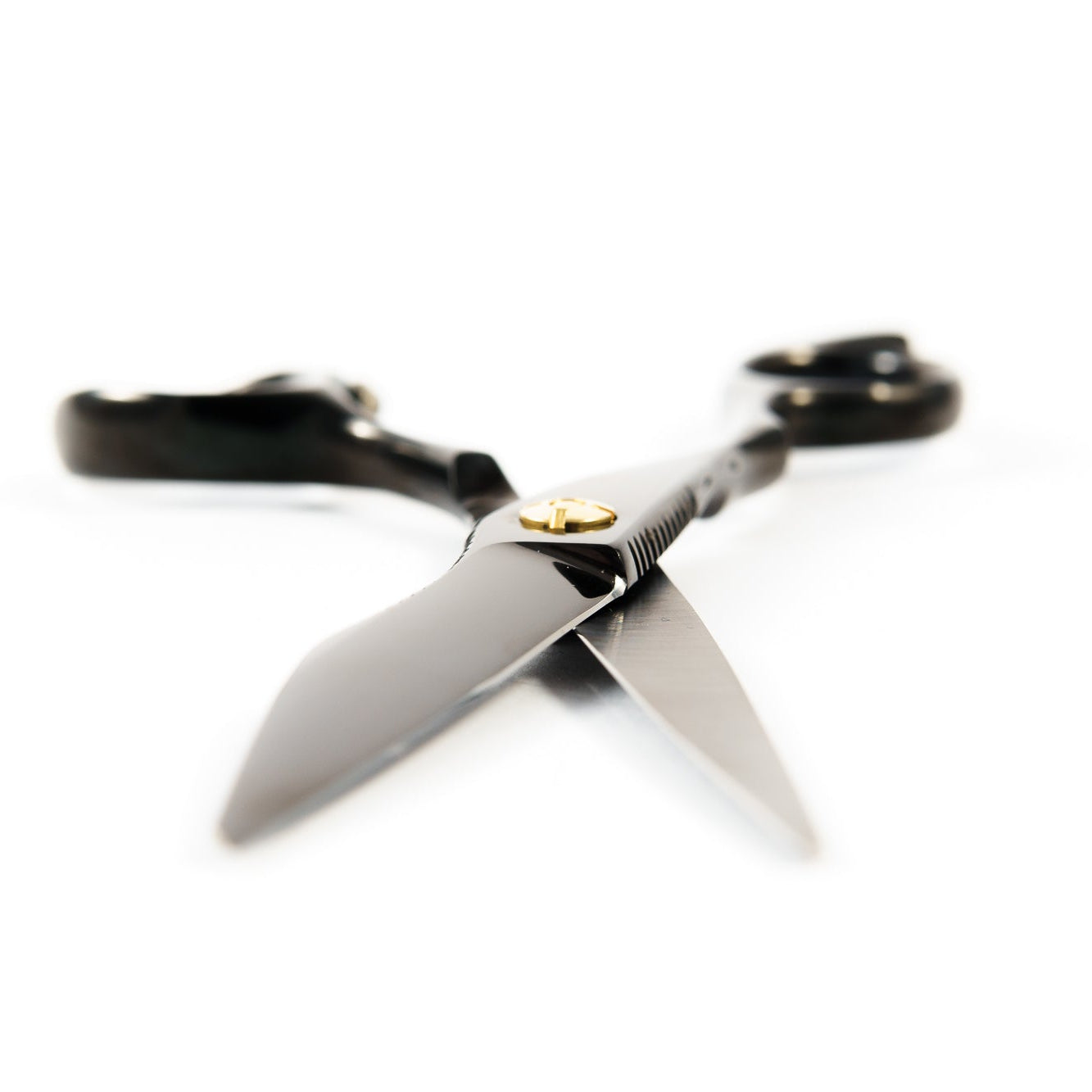 Chi left handed hair cutting scissors / shears Japanese steel blade open on white