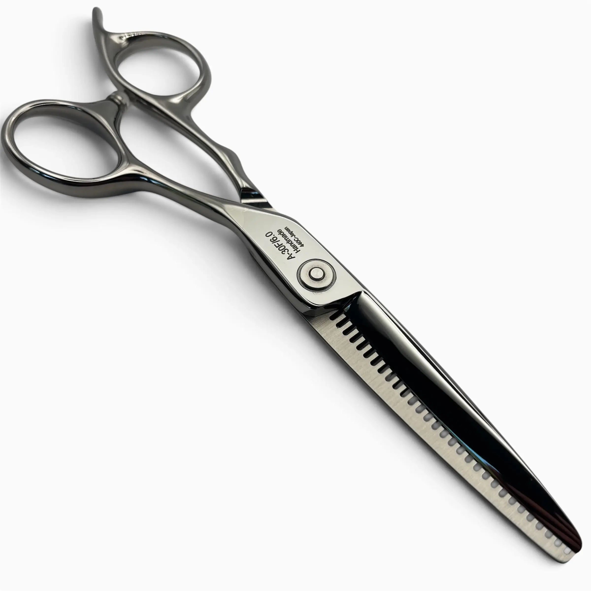 A pair of A-30F thinning shears with a metallic silver finish, featuring a comb blade and ergonomic finger loops.