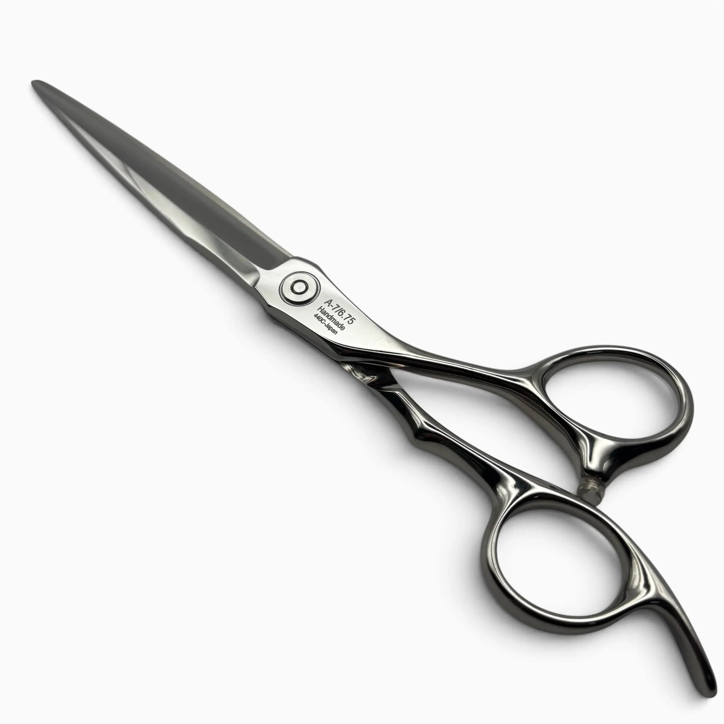 Katana S hairdressing shears with a polished silver stainless steel blade and black metal handles, shown on a clean white background.