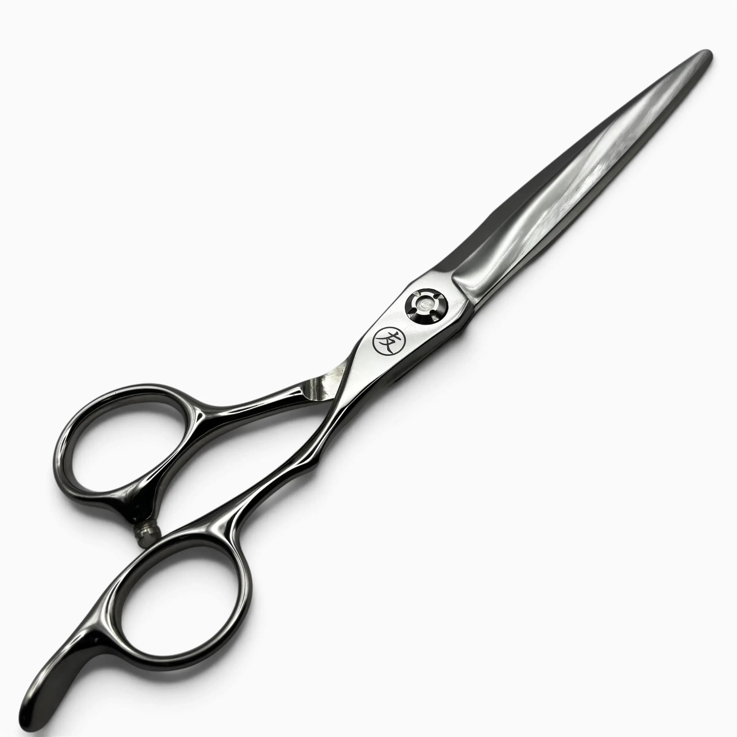A pair of professional hair shears with black textured handles and silver stainless steel blades, shown on a clean white background.