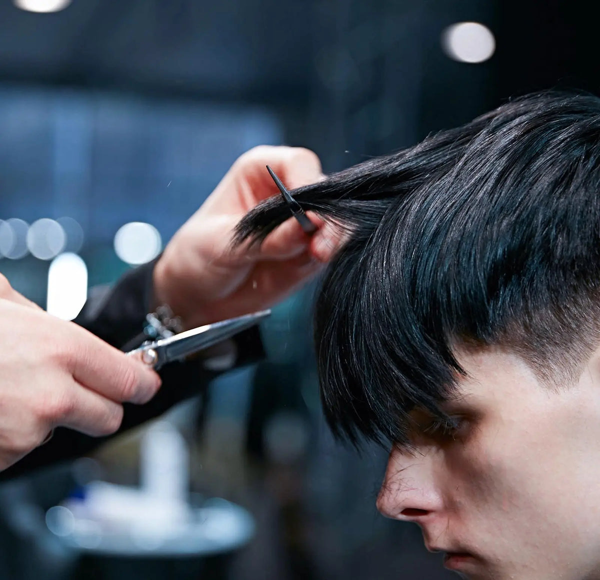 Professional stylist using Akito Scissors 