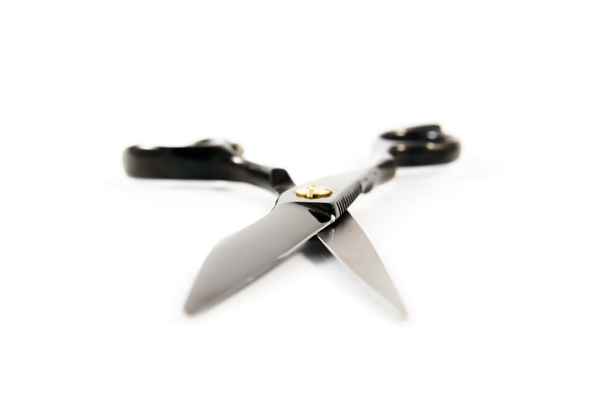 Chi Lefty Black semi convex blade open on white